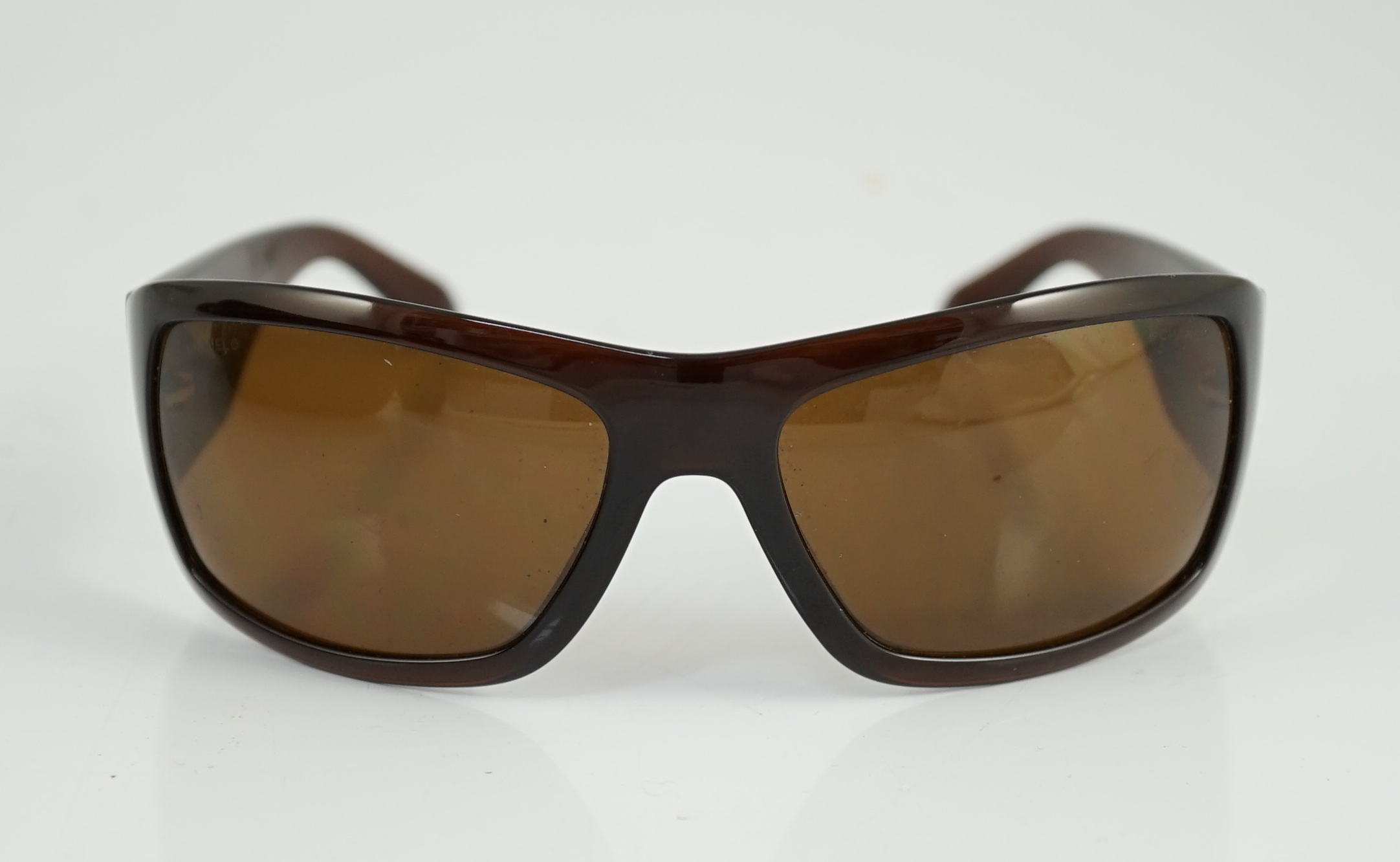 A pair of Chanel brown sunglasses